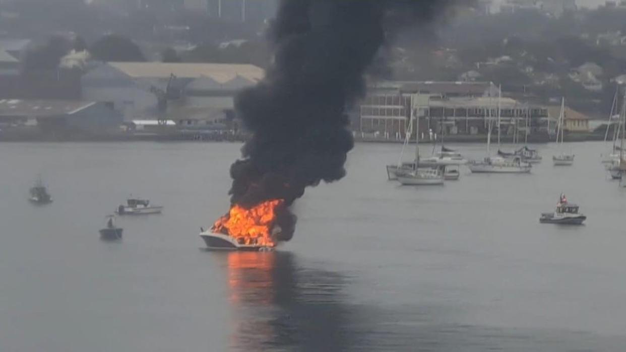 A boat has caught on fire under the Iron Cove bridge in Sydney this morning Picture: Joshua Wolterding / Facebook
