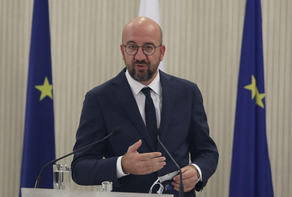 European Union Council President Charles Michel talks to the media during a press conference after a meeting with Cyprus President Nicos Anastasiades at the Presidential Palace in the capital Nicosia, Cyprus, Wednesday, Sept. 16, 2020. Michel is visiting Cyprus after traveling to Greece amid a diplomatic drive to de-escalate a weeks-long standoff at sea over Turkey's hydrocarbons search in waters were Greece and Cyprus claim exclusive economic rights. (Yiannis Kourtoglou, Pool via AP)