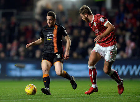 Soccer Football - Championship - Bristol City vs Wolverhampton Wanderers - Ashton Gate Stadium, Bristol, Britain - December 30, 2017 Wolves' Diogo Jota in action with Bristol City's Nathan Baker Action Images/Alan Walter