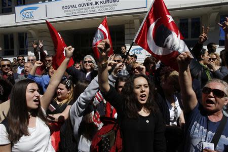 Supporters of Republican People's Party (CHP) shout anti-government slogans outside the Supreme Electoral Council (YSK) in Ankara April 1, 2014. REUTERS/Umit Bektas