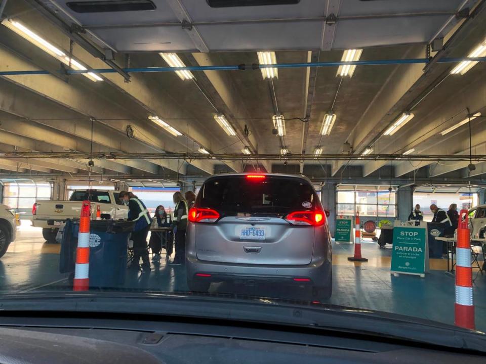 Cars pull into the garage of Charlotte Motor Speedway on Friday where the COVID-19 vaccines were given. The whole process took an hour, which included some travel time on the speedway’s track. Photo courtesy of the Jennifer Halls.