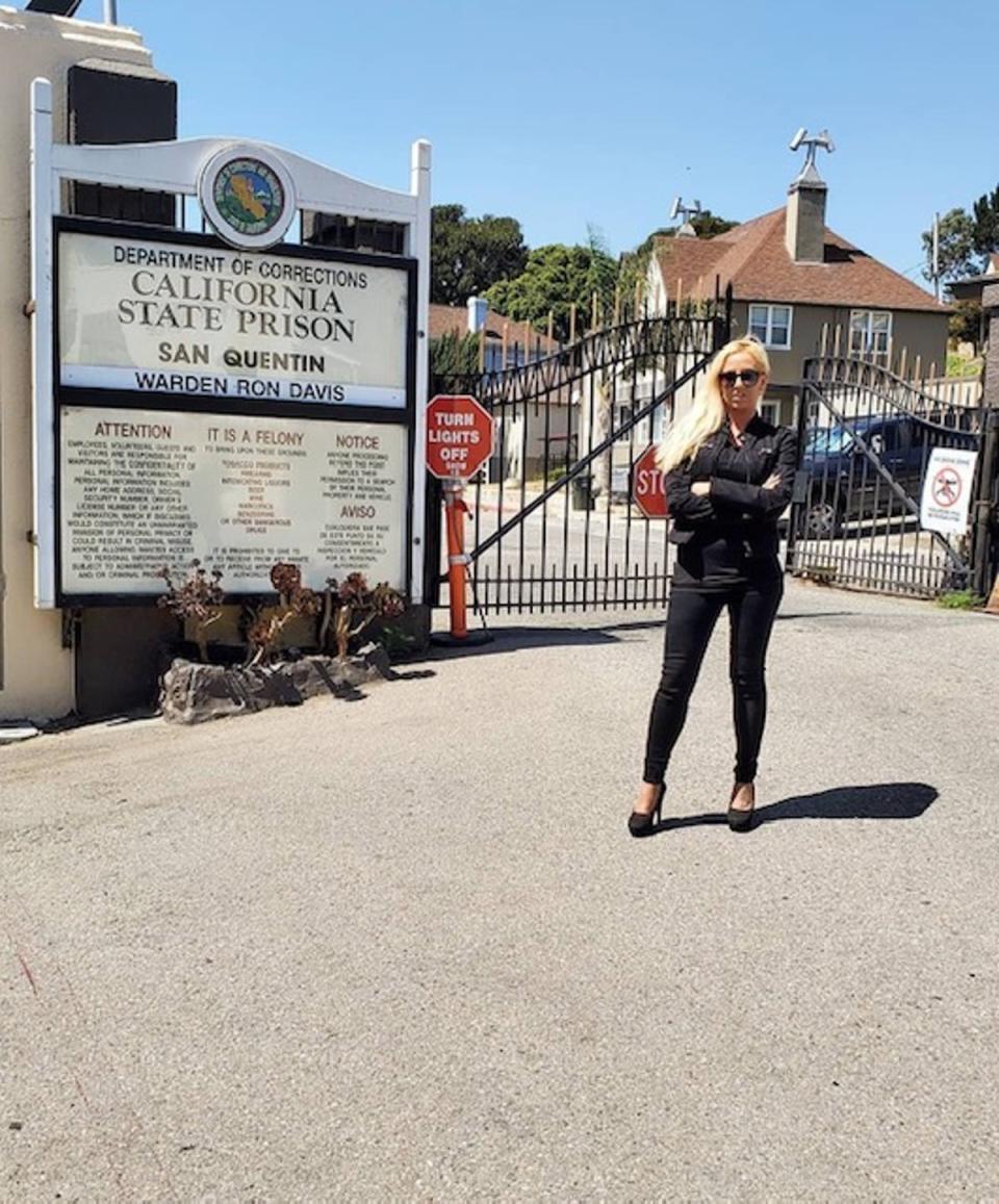 Forensic psychology practitioner Laura Brand, who has interviewed dozens of serial killers, stands outside of San Quentin prison in California (Laura Brand)