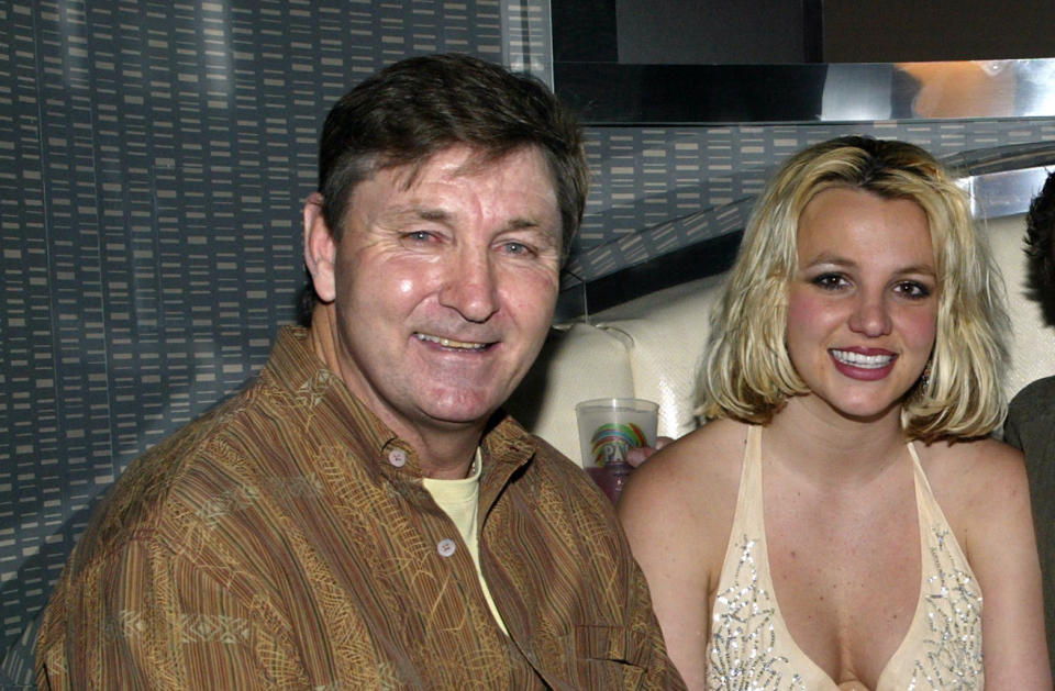 Singer Britney Spears (2nd,L) and family (L-R), father Jamie, brother Bryan and mother Lynne celebrate with Jamie Spears's partners (not shown) George and Phil Maloof and John Decastro, at the launch party for their new Palms Home Poker Host software held at the one of a kind Hardwood Suite at the Palms Casino Resort in Las Vegas. (Photo by Chris Farina/Corbis via Getty Images)