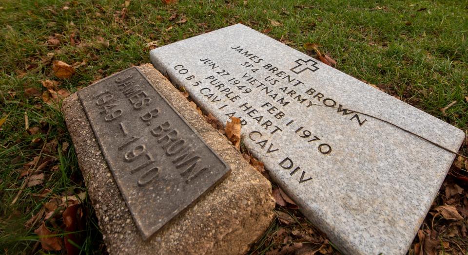 A stone for James Brent Brown is different from the other now stones because it was ordered by his mother in 1970. The stone was delivered at that time and no one was there to receive it. His mother died in 1971. Over the next 50 years, the double Bronze Star and Purple Heart recipient's  smaller stone, at left, disappeared into the ground.