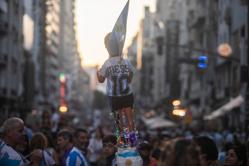 A doll representing Lionel Messi is seen as Argentina fans celebrate  their team's World Cup 2-1 victory over Australia at the obelisk, in Buenos Aires, Argentina December 3, 2022. (Photo by Matías Baglietto/NurPhoto via Getty Images)