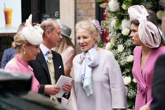 The Earl and Countess of Wessex talk to Princess Michael of Kent, centre, following the wedding of Flora Ogilvy