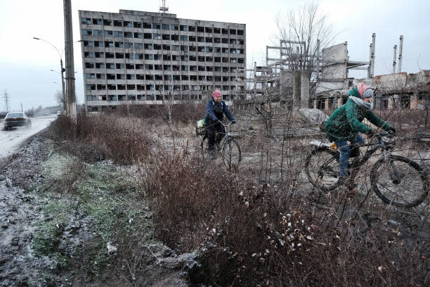 People move through the town of Kupiansk which has experienced regular shelling from the Russians on 6January 2023 in Kupiansk, Ukraine (Getty Images)