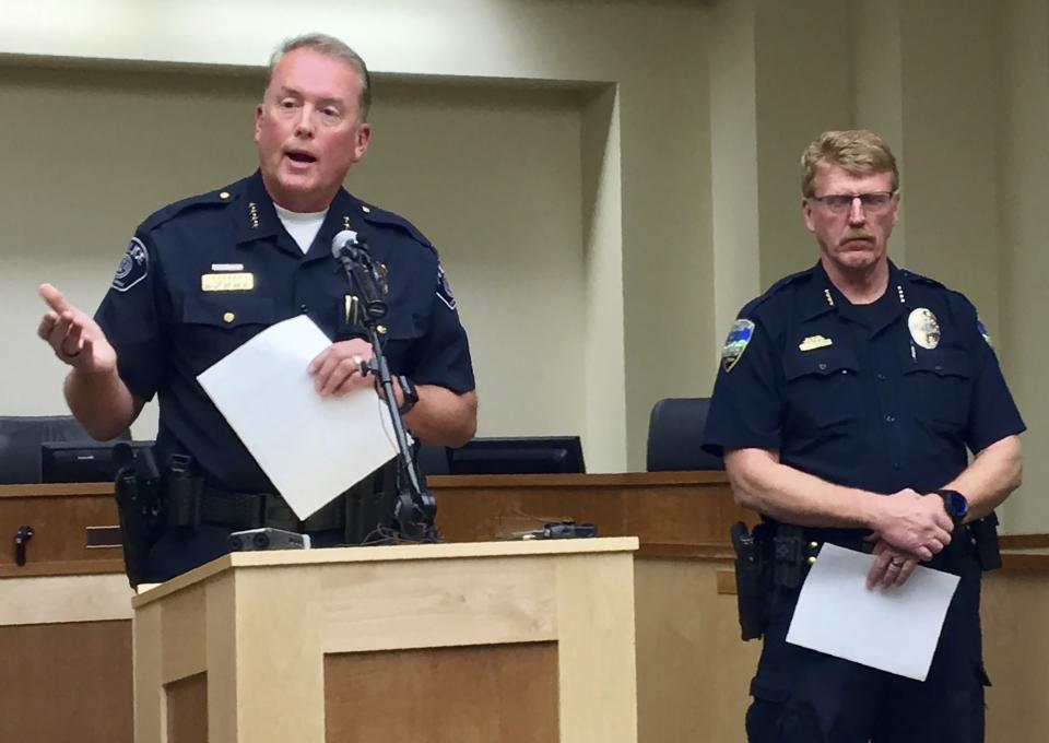 Woods Cross, Utah, Police Chief Chad Soffe, left, and Centerville Police Chief Paul Child speak at a news conference Monday, June 10, 2019, in Woods Cross. Soffe said a Woods Cross police officer who pulled his gun on a 10-year-old child will continue to work amid an independent review of the incident. Jerri Hrubes said the white officer pulled his gun on her son, DJ, who is black, while he was playing on the front lawn Thursday, June 6, 2019. (AP Photo/Morgan Smith)