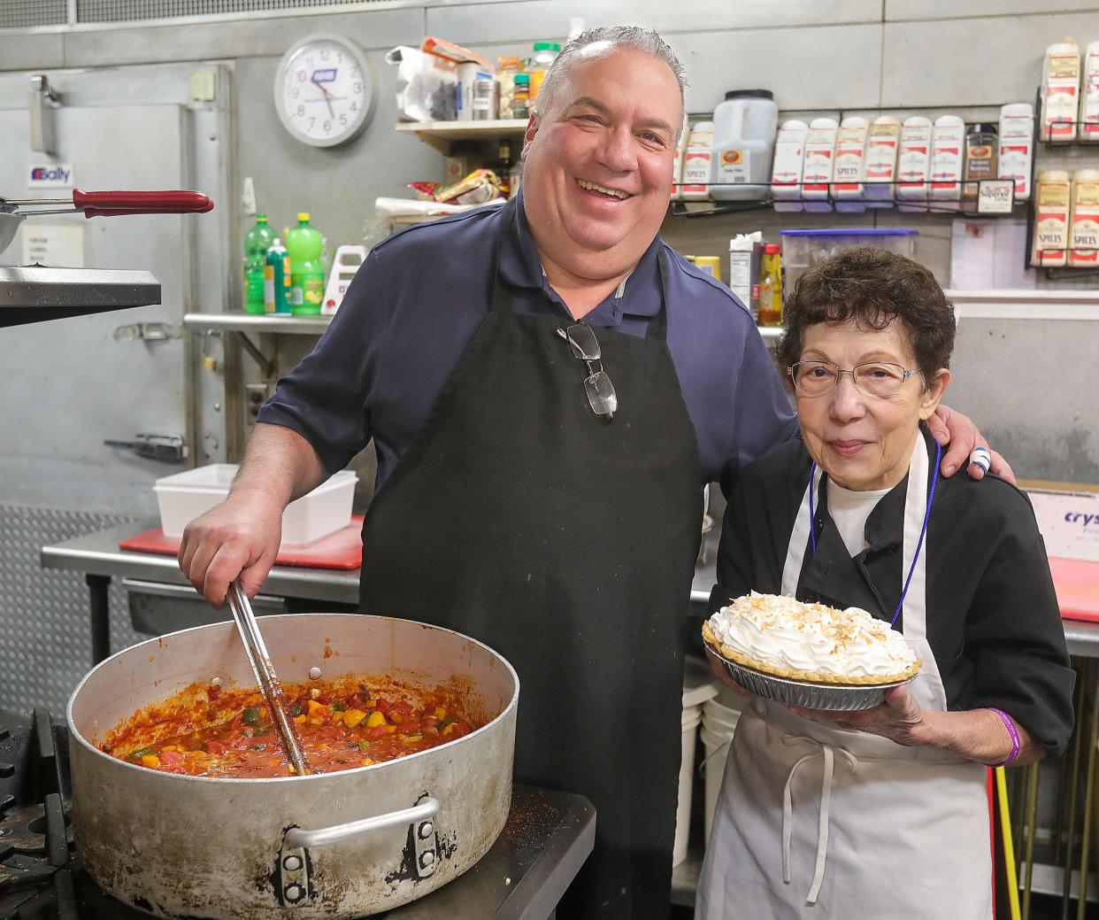 Chef Beau Schmidt works in this kitchen with his mother, Jerry Schmidt, at Beau's Grille in the Akron-Fairlawn Hilton on April 25 in Fairlawn.