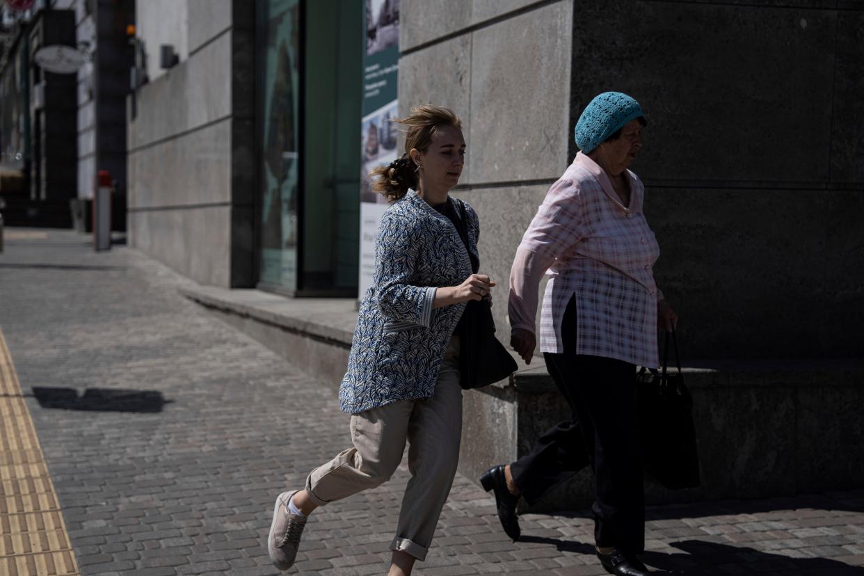 People run to take shelter during air attacks on Kyiv on Monday (Copyright 2020 The Associated Press. All rights reserved)