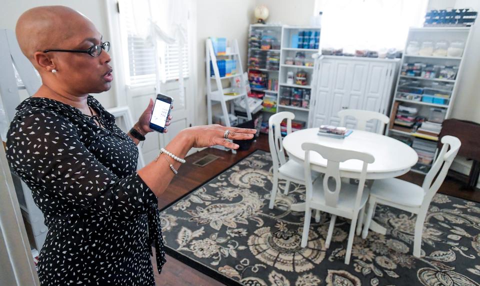 Denise Williams, who started the Inspired Child project, is shown at her home where she has a book club for youth in Montgomery, Ala., on Monday August 14, 2023.