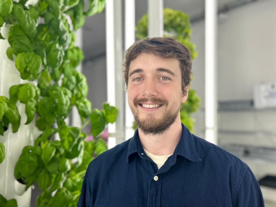 Brian Goggin is the farm manager for Project Village Indoor Farm, a leafy greens and herbs farming project from Eastern Charlotte Waterways. Goggin's favourite plant at the farm is basil. 