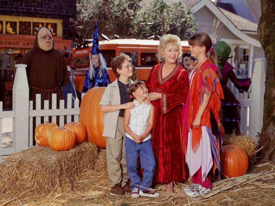 <p>Singer White/Ventura Valley Film/Kobal/Shutterstock</p> Left to right: Joey Zimmerman, Emily Roeske, Debbie Reynolds and Kimberly J. Brown in 