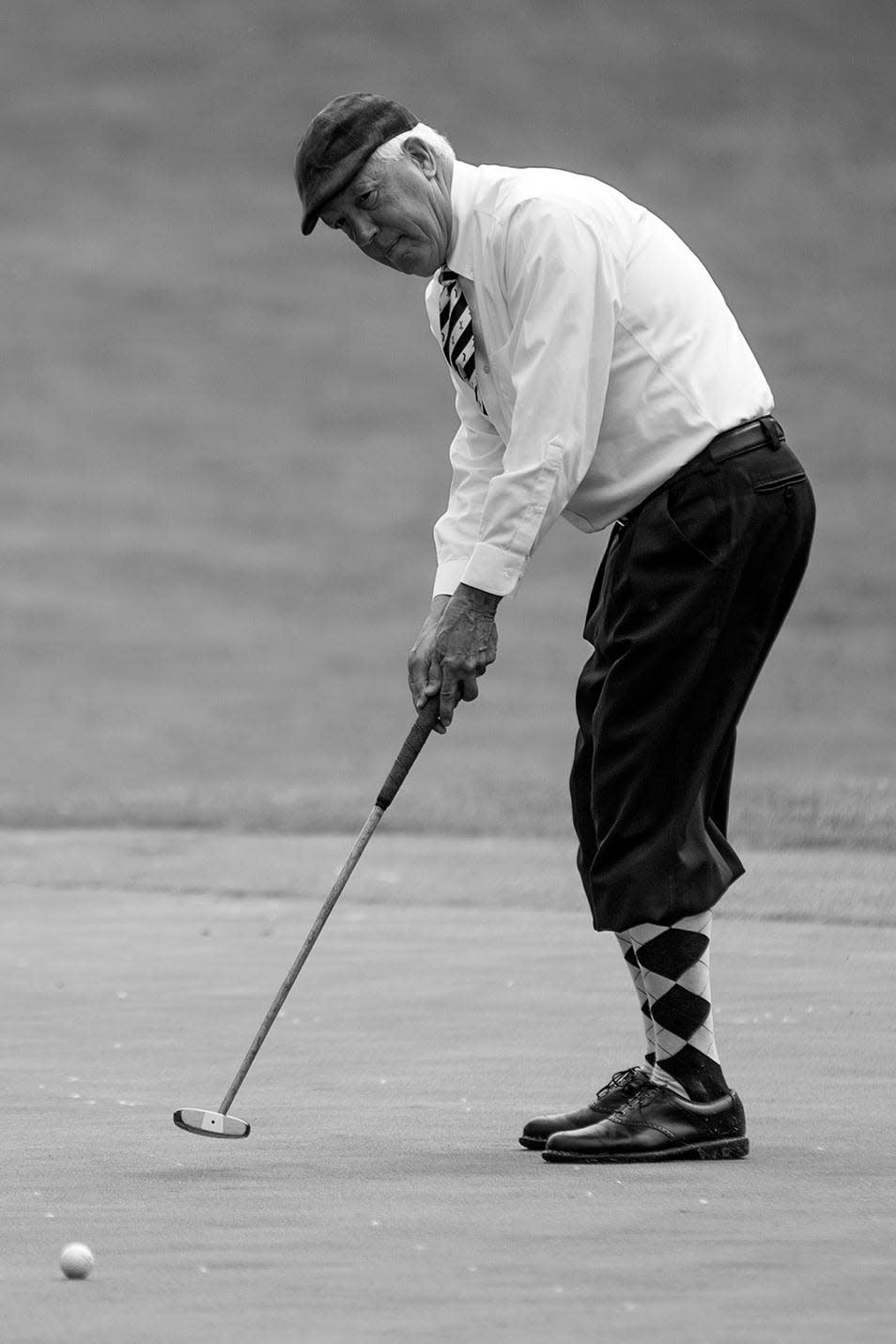 Galesburg's George Burgland partakes in The Society of Hickory Golfers' Mid American Hickory Golf Open last May at Soangetaha Country Club.