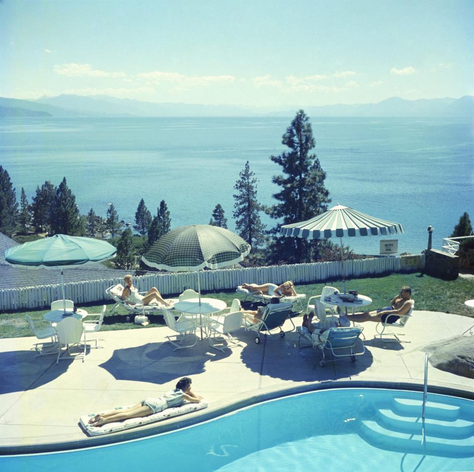 A view of Lake Tahoe as guests sit around the pool of the Cal Neva Lodge in 1959