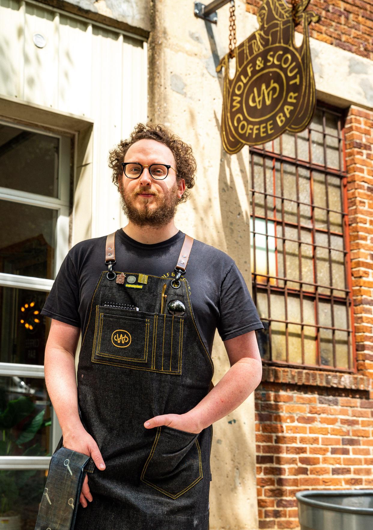 Chase Richmond Bobier, owner and operator of Wolf & Scout, outside of his business in Columbia, Tenn. on Aug. 24, 2022. Bobier is moving locations after over a year in the Columbia arts district and will be turning over his lease to another growing business in Columbia. 