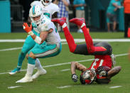 <p>Miami Dolphins’ Kiko Alonso (47) watches Tampa Bay Buccaneers’ Mike Evans roll on the field after a reception in the first quarter on Sunday, Nov. 19, 2017 at Hard Rock Stadium in Miami Gardens, Fla. (Charles Trainor Jr./Miami Herald/TNS) </p>