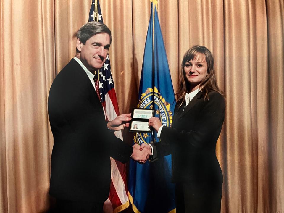 Badolato with former FBI director Robert Mueller on the day she graduated from the academy in 2002.