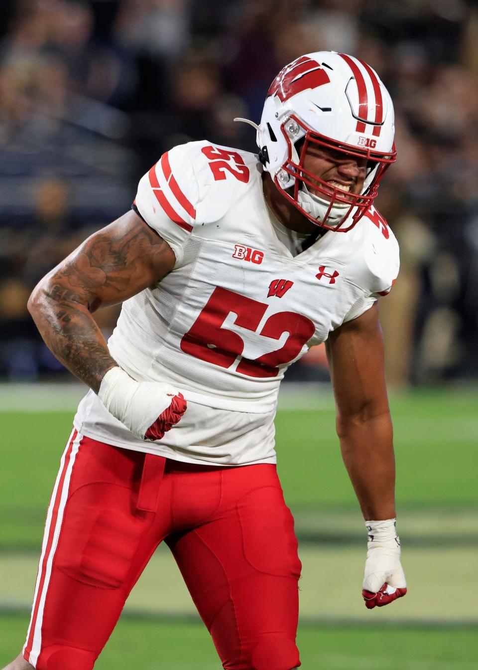 Kaden Johnson #52 of the Wisconsin Badgers reacts after a fumble recovery during the second half in the game against the Purdue Boilermakers at Ross-Ade Stadium on September 22, 2023 in West Lafayette, Indiana.