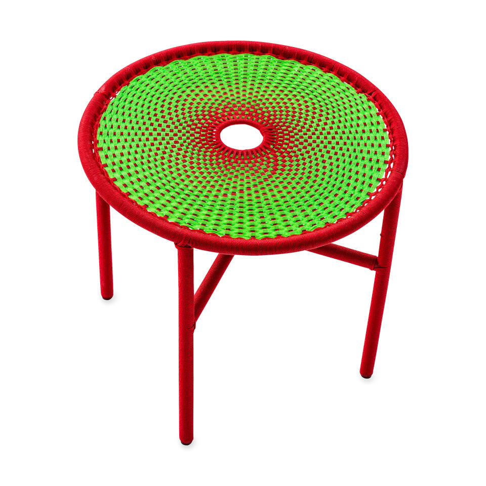 This photo provided by the MoMA Design Store shows the M'Afrique Banjooli Table. If you want something a little more avant garde, designers are coming up with some cool, imaginative pieces for the artsy backyard and balcony. (MoMA Design Store via AP)