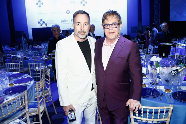 David Furnish and Sir Elton John pose as they attend a dinner and auction during the Leonardo DiCaprio Foundation’s 2nd Annual Saint-Tropez Gala at Domaine Bertaud Belieu.