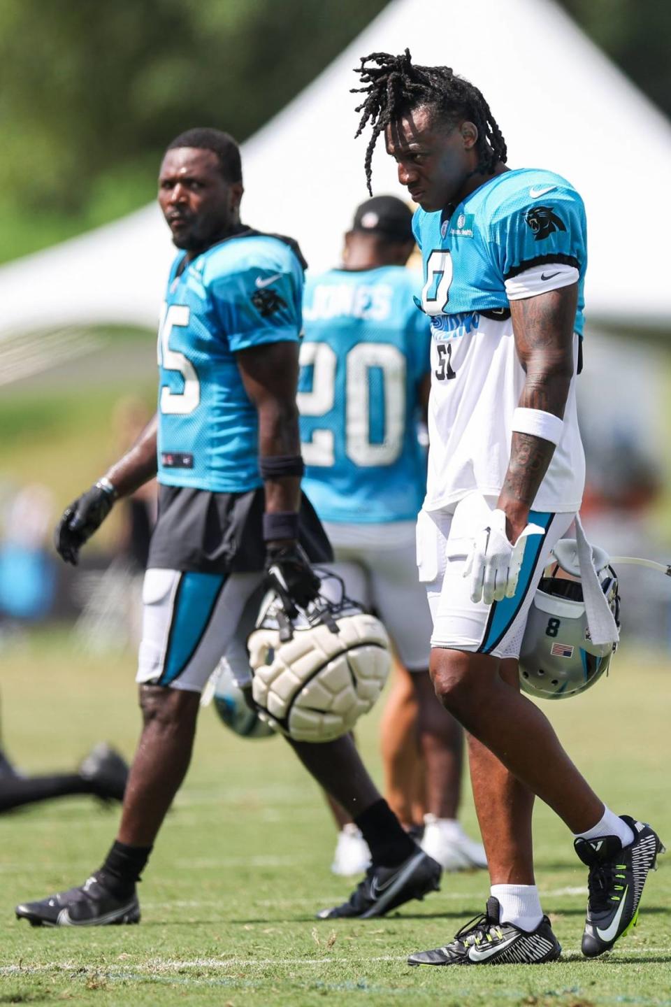 Panthers safety Jaycee Horn, right, walks off the field during training camp at Wofford College on Tuesday, August 9, 2022 in Spartanburg, SC.