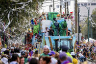 Krewe of Tucks parades on the Uptown route through New Orleans on Saturday, Feb. 10, 2024, during carnival season before Mardi Gras. (Sophia Germer/The Times-Picayune/The New Orleans Advocate via AP)