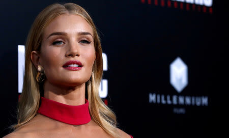 FILE PHOTO: Model Rosie Huntington-Whiteley poses at movie premiere in Los Angeles. REUTERS/Mario Anzuoni /File Photo