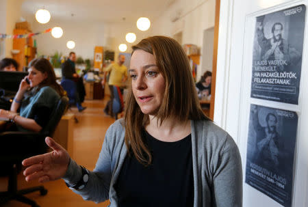 Marta Pardavi, co-chair of the asylum rights group Helsinki Committee, gestures during an interview in the group's headquarters in Budapest, Hungary, February 13, 2017. Picture taken February 13, 2017. REUTERS/Laszlo Balogh