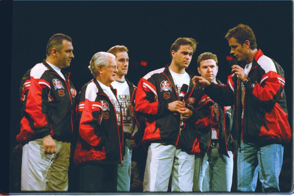 Two nights after the Cup clincher, masseur Sergei Mnatsakanov (far left) joined the rest of the Wings’ support staff on center stage during a rally for season-ticket holders at The Joe. He was hired in 1995 at the urging of Slava Fetisov, who knew him from their days with rival Russian hockey clubs.