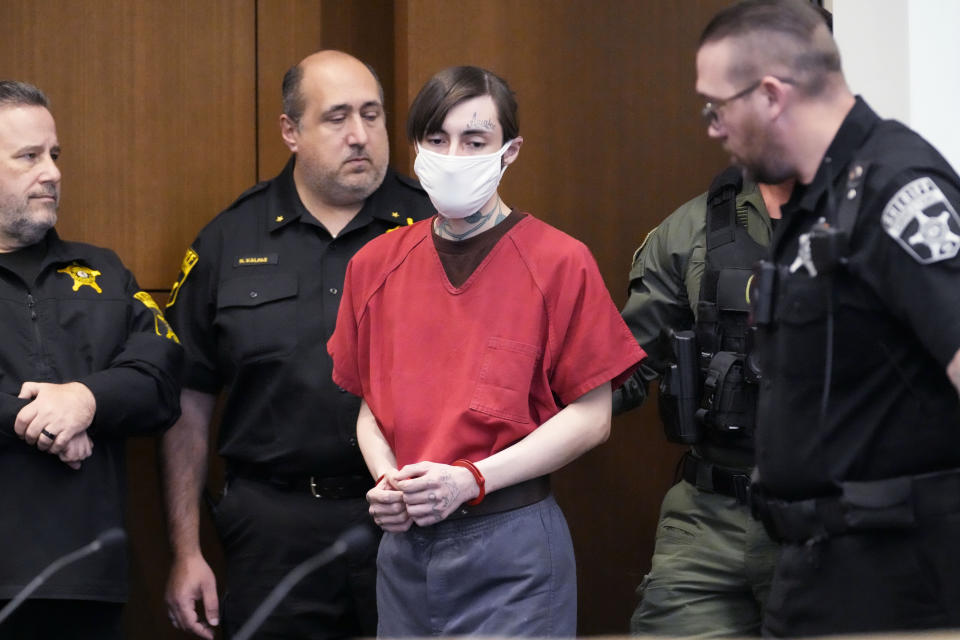 Robert E. Crimo III, is escorted into a courtroom during a case management conference before Judge Victoria A. Rossetti at the Lake County Courthouse Friday, Jan 5, 2024, in Waukegan, Ill. A case management conference is scheduled for a suspect in a mass shooting that left seven people dead during a July 4 parade in Highland Park, Illinois. (AP Photo/Nam Y. Huh, Pool)