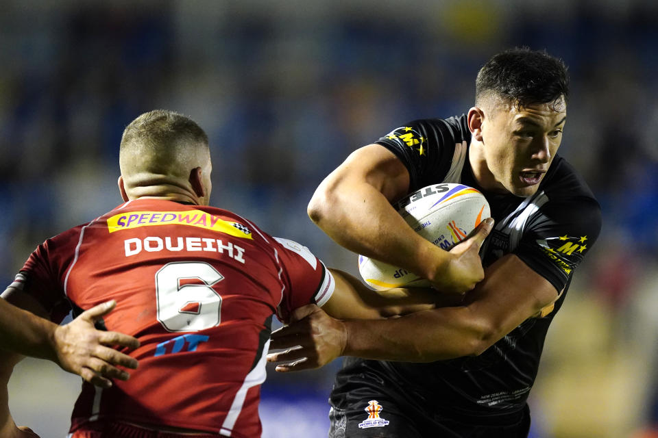 Adam Doueihi, pictured here tackling Joseph Manu during Lebanon's clash with New Zealand at the Rugby League World Cup.