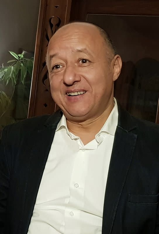 Gasser Abdel Razek, Executive Director of the Egyptian Initiative for Personal Rights (EIPR) reacts during an interview in Cairo