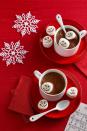 <p>Use a toothpick dipped into melted dark chocolate and orange candy melts to dab on eyes, a mouth, and, of course, a carrot nose. Serve in your favorite hot chocolate and drink quickly before they melt!</p><p><a href="https://www.womansday.com/food-recipes/recipes/a56905/frosty-the-snowman-marshmallows-recipe/" rel="nofollow noopener" target="_blank" data-ylk="slk:Get the recipe.;elm:context_link;itc:0;sec:content-canvas" class="link "><em>Get the recipe.</em></a>  </p>