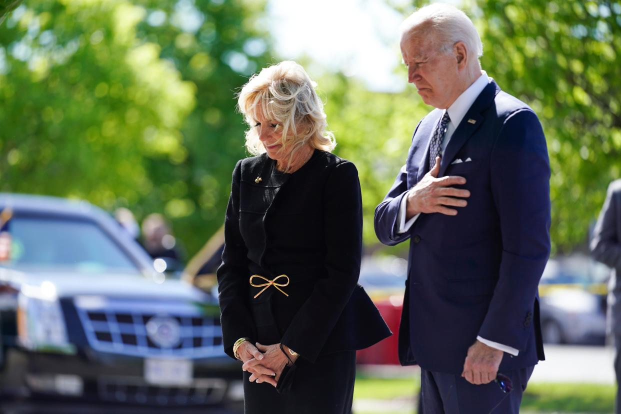 President Joe Biden and first lady Jill Biden pay respects to the victims of a Tops supermarket shooting in Buffalo on Tuesday, May 17, 2022.