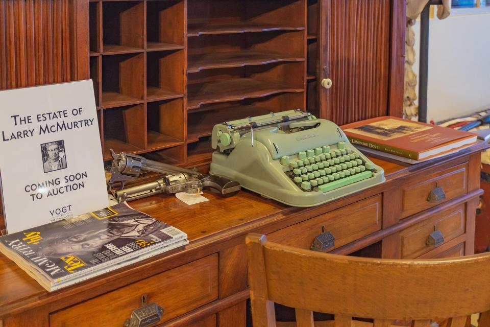 Author Larry McMurtry's typewriters, writing desk, personal copies of his landmark books, his firearms, boots, memorabilia from his Hollywood movies, as well as artwork and furnishings from his home went up for auction in San Antonio on May 29.