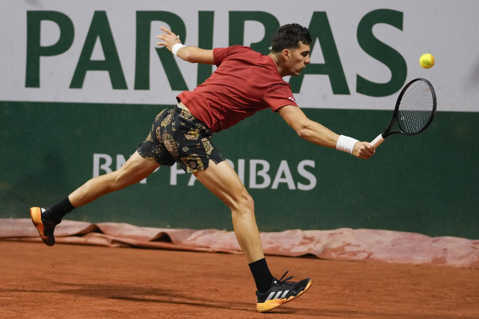 Greece's Thanasi Kokkinakis plays a shot against Taylor Fritz of the U.S. during their third round match of the French Open tennis tournament at the Roland Garros stadium in Paris, Saturday, June 1, 2024. (AP Photo/Thibault Camus)
