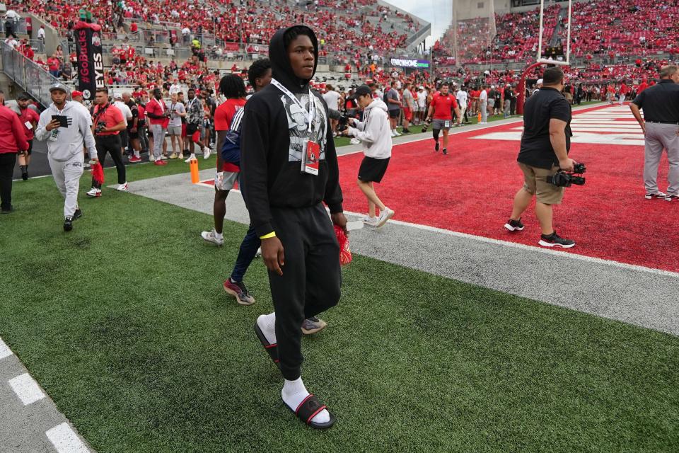 Sep 3, 2022; Columbus, Ohio, USA;  Ohio State football recruit WR Jeremiah Smith walks on the field prior to the NCAA football game between the Ohio State Buckeyes and Notre Dame Fighting Irish at Ohio Stadium. Mandatory Credit: Adam Cairns-USA TODAY Sports