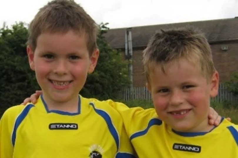 Seb, left, and Oscar playing football -Credit:UGC/FAMILY/MEN