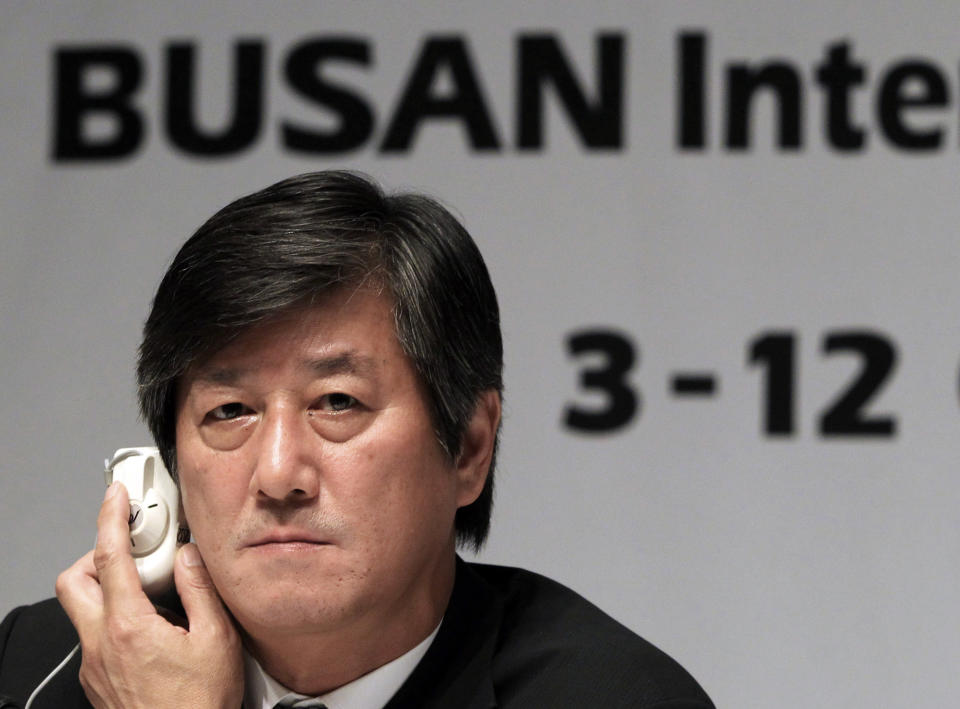 Lee Yong-kwan, director of the Busan International Film Festival, listens to a question during a press conference in Seoul, South Korea, Tuesday, Sept. 3, 2013. The festival will be held at the Busan Cinema Center and seven other movie theaters in the southern port city of Busan from Oct. 3-12.(AP Photo/Ahn Young-joon)