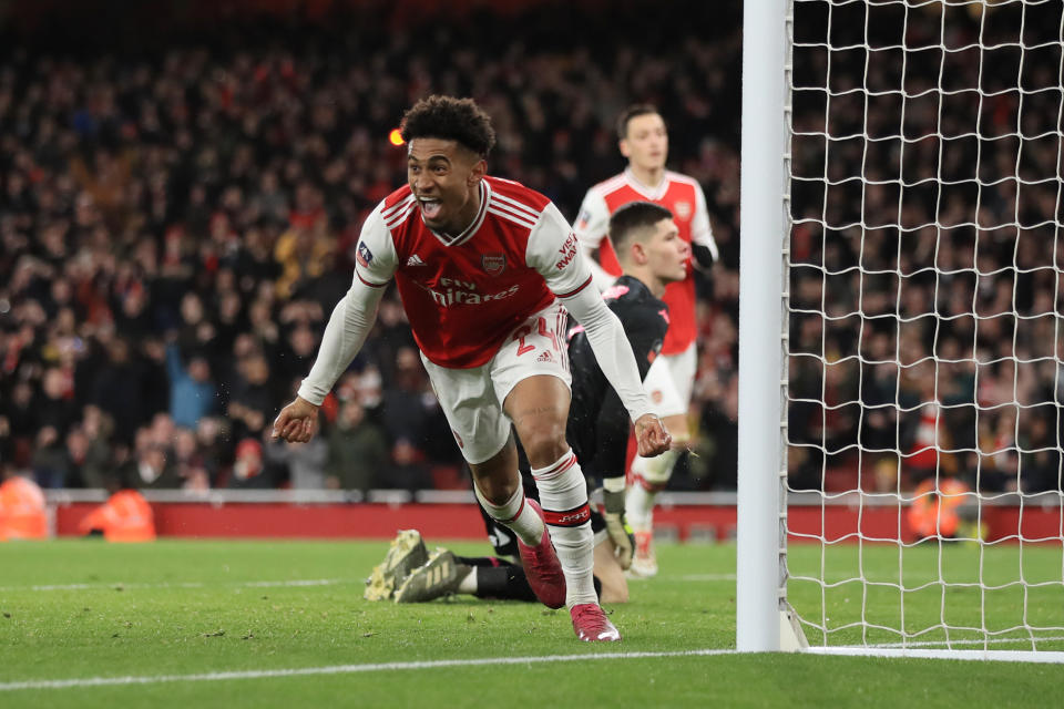 LONDON, ENGLAND - JANUARY 06: Reiss Nelson of Arsenal celebrates scoring the opening goal during the FA Cup Third Round match between Arsenal and Leeds United at Emirates Stadium on January 6, 2020 in London, England. (Photo by Marc Atkins/Getty Images)