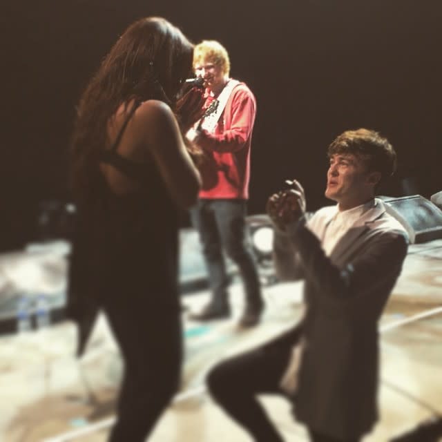Ed Sheeran is a champion for love and romance! The 24-year-old "Thinking Out Loud" singer helped his buddy, musician Jake Roche, pull off an epic proposal at the Manchester Arena on Sunday, and it was simply amazing. <strong>WATCH: Ed Sheeran Surprises Couple and Becomes the Best Wedding Singer of All Time </strong> Roche -- who is part of the British pop band Rixton -- popped the question to his girlfriend, Little Mix singer Jesy Nelson, and Sheeran was on hand to play their favorite song. Roche, 22, shared the heartwarming moment on Instagram, writing, "A year ago today I met her at Manchester arena, so it was only right, with a little help from my friend, that this happened. Best day of my life." Sheeran actually drove five hours out of his way, while on a brief break from his own <em>X Tour</em>, just to do his friend a favor, which Roche thanked him for on Twitter. @Jake_Rixton my absolute pleasure. Thanks for the KFC— Ed Sheeran (@edsheeran) July 19, 2015 Little Mix was set to play the Key 103 Summer Live concert, and Sheeran came out as a surprise guest before Roche took the stage and got down on bended knee. Once again, the bar has been raised for others looking to pull off a stunning proposal. <strong>WATCH: Ed Sheeran Dances His Ass Off, Ditches Beer and Shows Off Sexy New Look in 'Thinking Out Loud' </strong> Sheeran is no stranger to wedding proposals being set to his music. At a show in October, five different couples in the audience got engaged in one night! Sheeran also surprised a bride and groom at their wedding in March, and ended up serenading them during the traditional first dance. Check out the amazing moment: