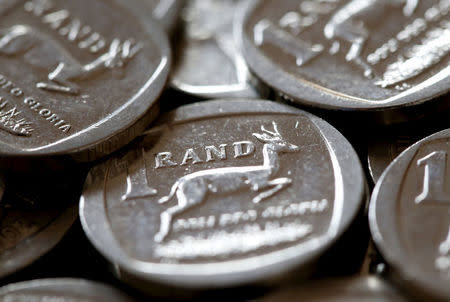 FILE PHOTO: South African Rand coins are seen in this photo illustration taken September 9, 2015. REUTERS/Mike Hutchings/File Photo