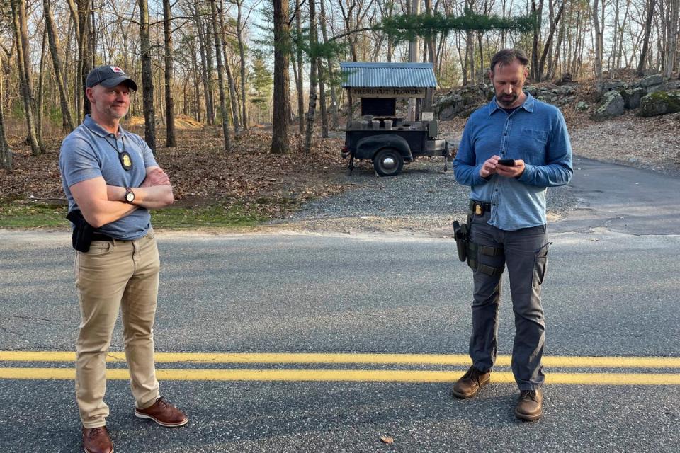 FBI officials guard the driveway where Jack Teixeira, a Massachusetts Air National Guard member, was taken into custody. (AP)