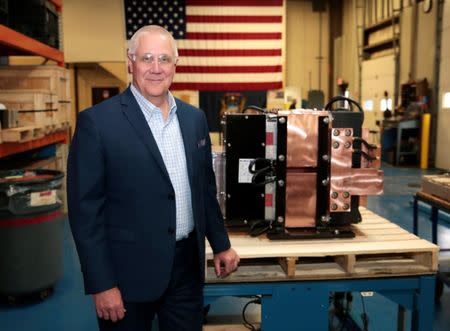 Bob Roth, CEO of transformer manufacturer RoMan Manufacturing poses for a photograph in his plant in Grand Rapids, Michigan, U.S. December 12, 2018. Picture taken December 12, 2018. REUTERS/Rebecca Cook