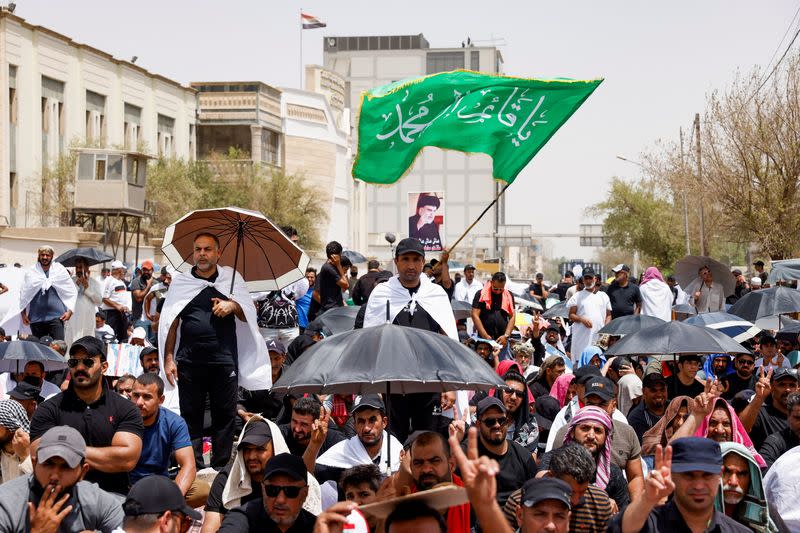 Supporters of Iraqi populist leader Moqtada al-Sadr gather for mass Friday prayer, in Baghdad