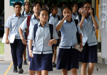 Students leave for classes after their recess at a secondary school in Singapore October 27, 2016. Picture taken October 27, 2016. REUTERS/Edgar Su