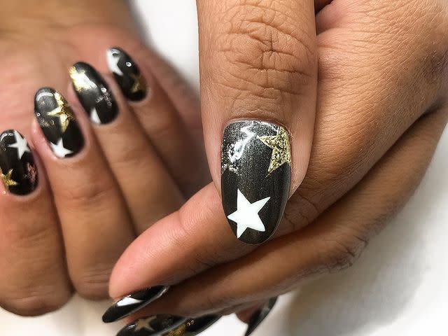 <p>Normally stars feel a little seasonal, like <a href="https://www.cosmopolitan.com/style-beauty/g10003228/4th-of-july-nails-manicure/" rel="nofollow noopener" target="_blank" data-ylk="slk:designs inspired by Fourth of July;elm:context_link;itc:0;sec:content-canvas" class="link ">designs inspired by Fourth of July</a> fireworks, but this <strong>black-and-white version with just a touch of <a href="https://www.cosmopolitan.com/style-beauty/beauty/g12831904/gold-nail-polish/" rel="nofollow noopener" target="_blank" data-ylk="slk:gold nail polish;elm:context_link;itc:0;sec:content-canvas" class="link ">gold nail polish</a></strong> feels like something you could wear year-round. </p><p><a href="https://www.instagram.com/p/B6axQSHgd_V/?utm_source=ig_embed&utm_campaign=loading" rel="nofollow noopener" target="_blank" data-ylk="slk:See the original post on Instagram;elm:context_link;itc:0;sec:content-canvas" class="link ">See the original post on Instagram</a></p>