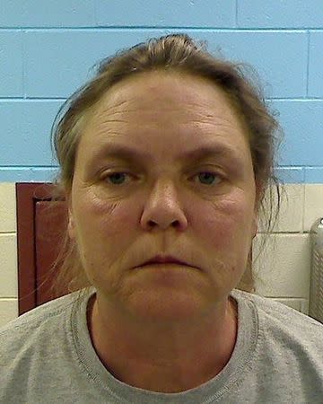 Joyce Hardin Garrard is seen in a booking photo released by the Etowah County Sheriff's Office in Etowah County, Alabama on February 23, 2012. REUTERS/Etowah County Sheriff's Office/Handout