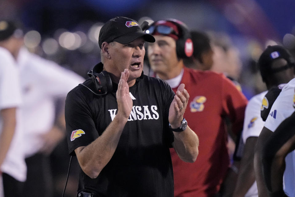 Kansas head coach Lance Leipold celebrates after a Kansas touchdown during the first half of an NCAA college football game against Illinois Friday, Sept. 8, 2023, in Lawrence, Kan. (AP Photo/Charlie Riedel)